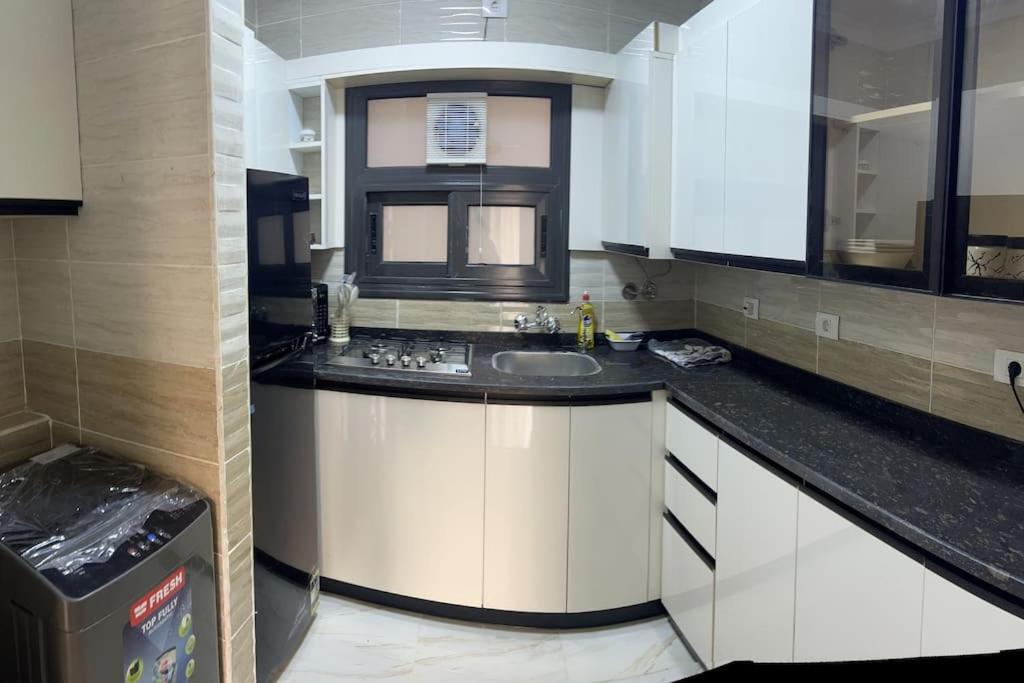 اطلاله حديقه و فرش فندقى بمدينتي Apartment