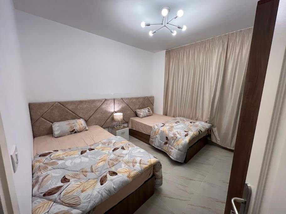 اطلاله حديقه و فرش فندقى بمدينتي Apartment